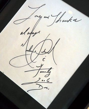 Occupying pride of place in the large, country kitchen is the framed page of the guest-book signed by the King of Pop.