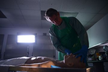 Dr. Shepherd is handling the simulated cadaver. Photo: Channel 5